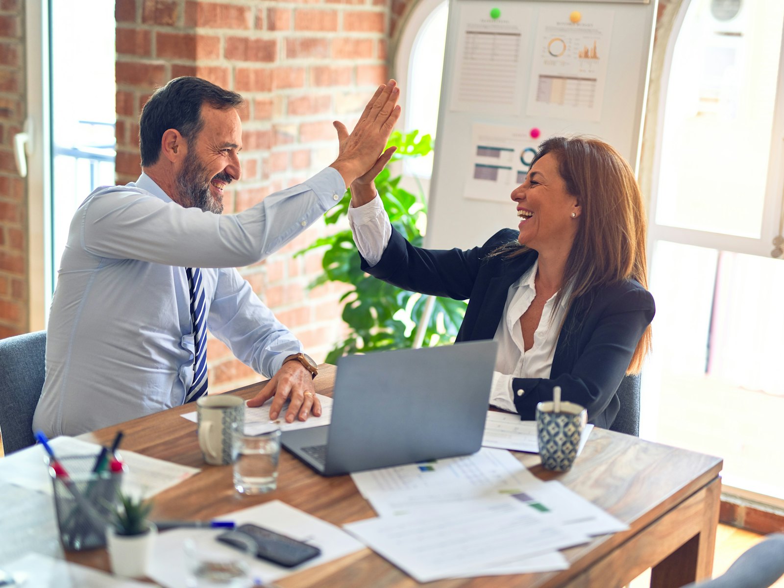 Session de travail entre un dirigeant et son conseiller